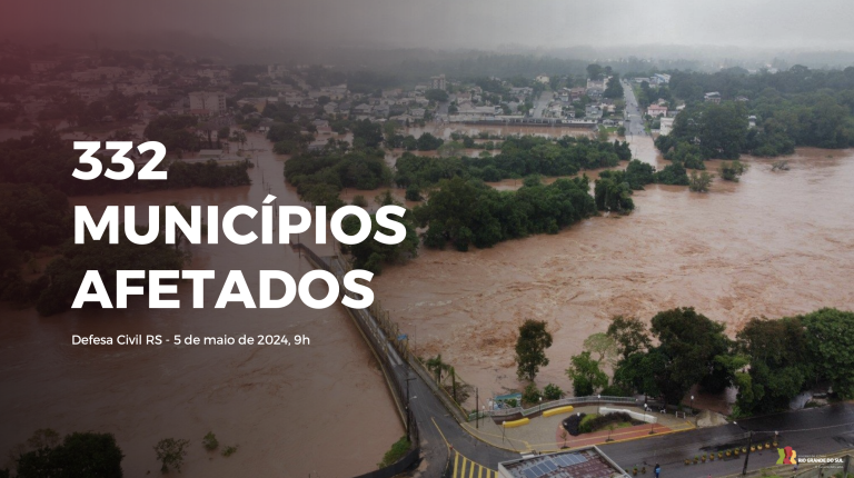 Aerial view of a flooded cityscape after heavy rains, with text overlay stating "332 municípios afetados" and a timestamp from defesa civil.