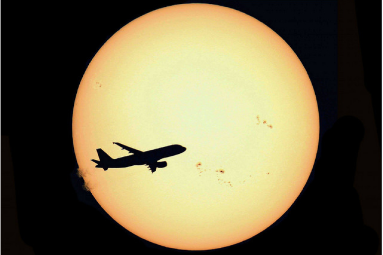 "Airliner and Sun Country" by S. Lebrigand