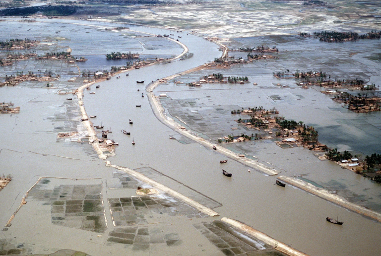 An aerial view of a flooded vilage.